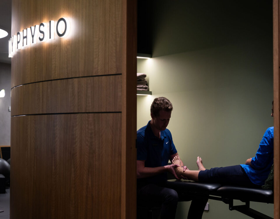 Physio Matt treating a foot in a treatment room